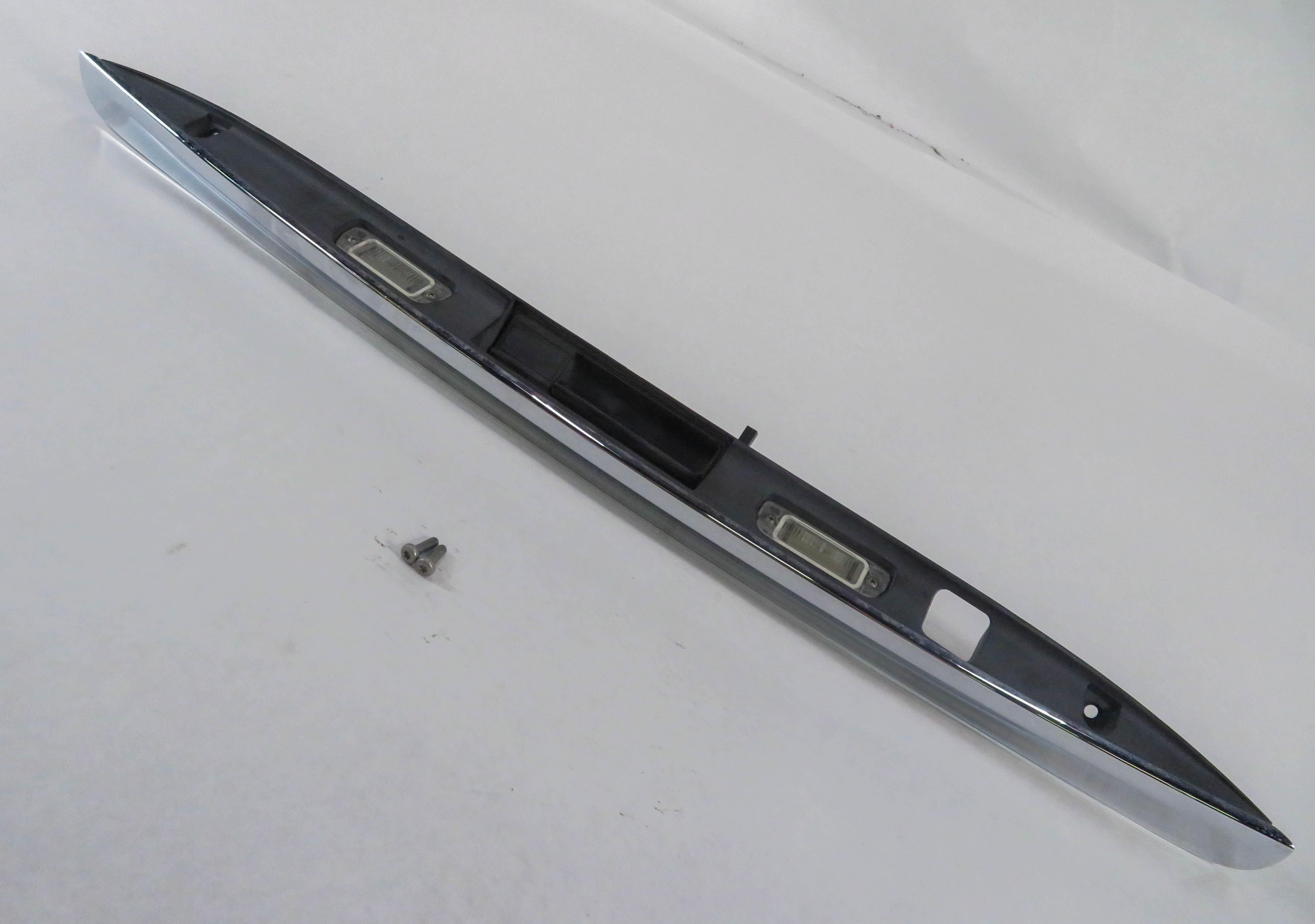 07 MERECEDES BENZ GL450 (X164) REAR TRUNK / HANDLE LICENSE LIGHT PANEL (CHROME) — exact item pictured