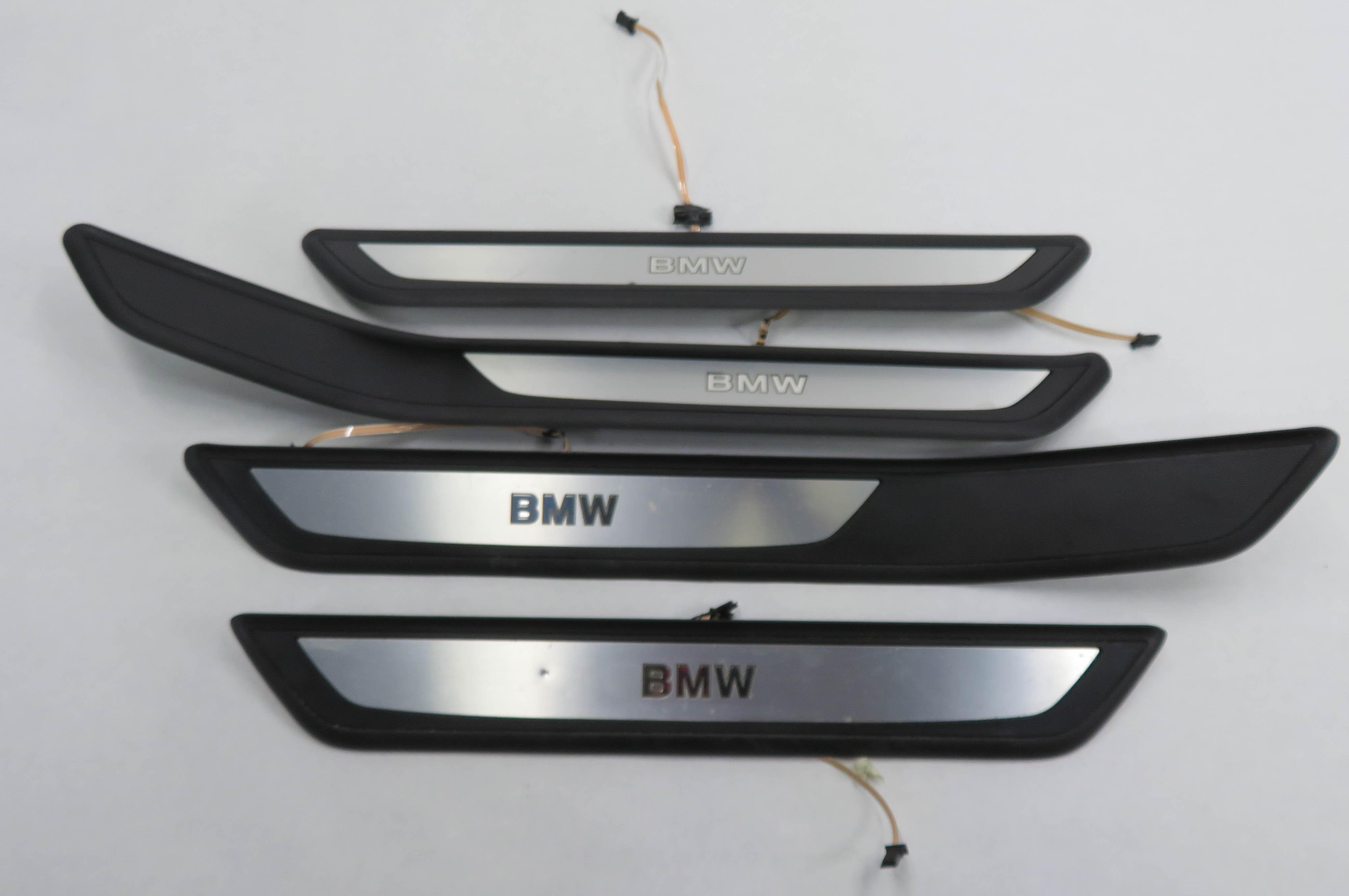 2011 BMW 750i (F01) DOOR SILL TRIM SET-4 (LIGHT UP) — exact item pictured