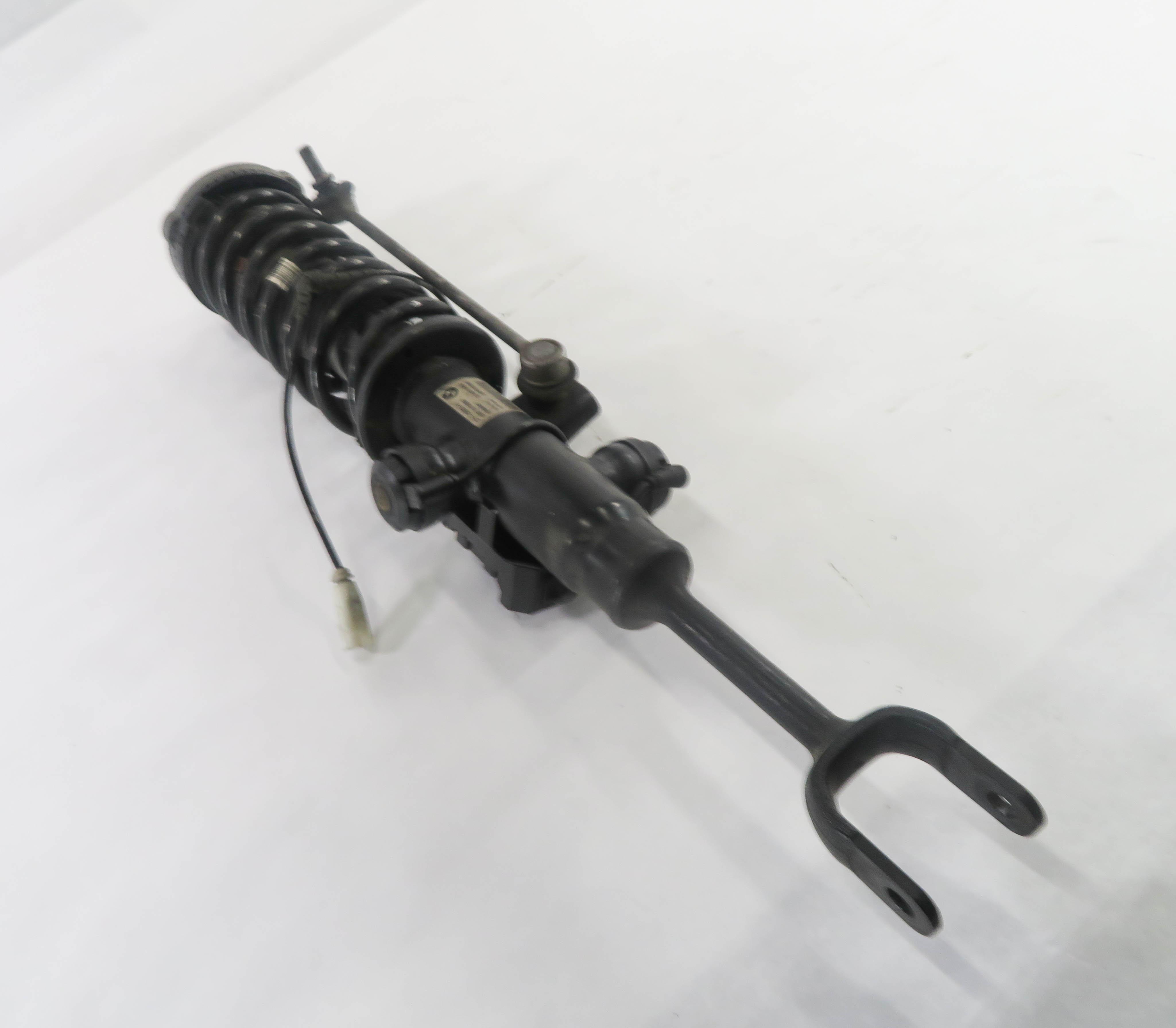 2011-2012 BMW ACTIVE HYBRID 7 (F04) RWD - LEFT FRONT DRIVER EDC SHOCK STRUT — exact item pictured
