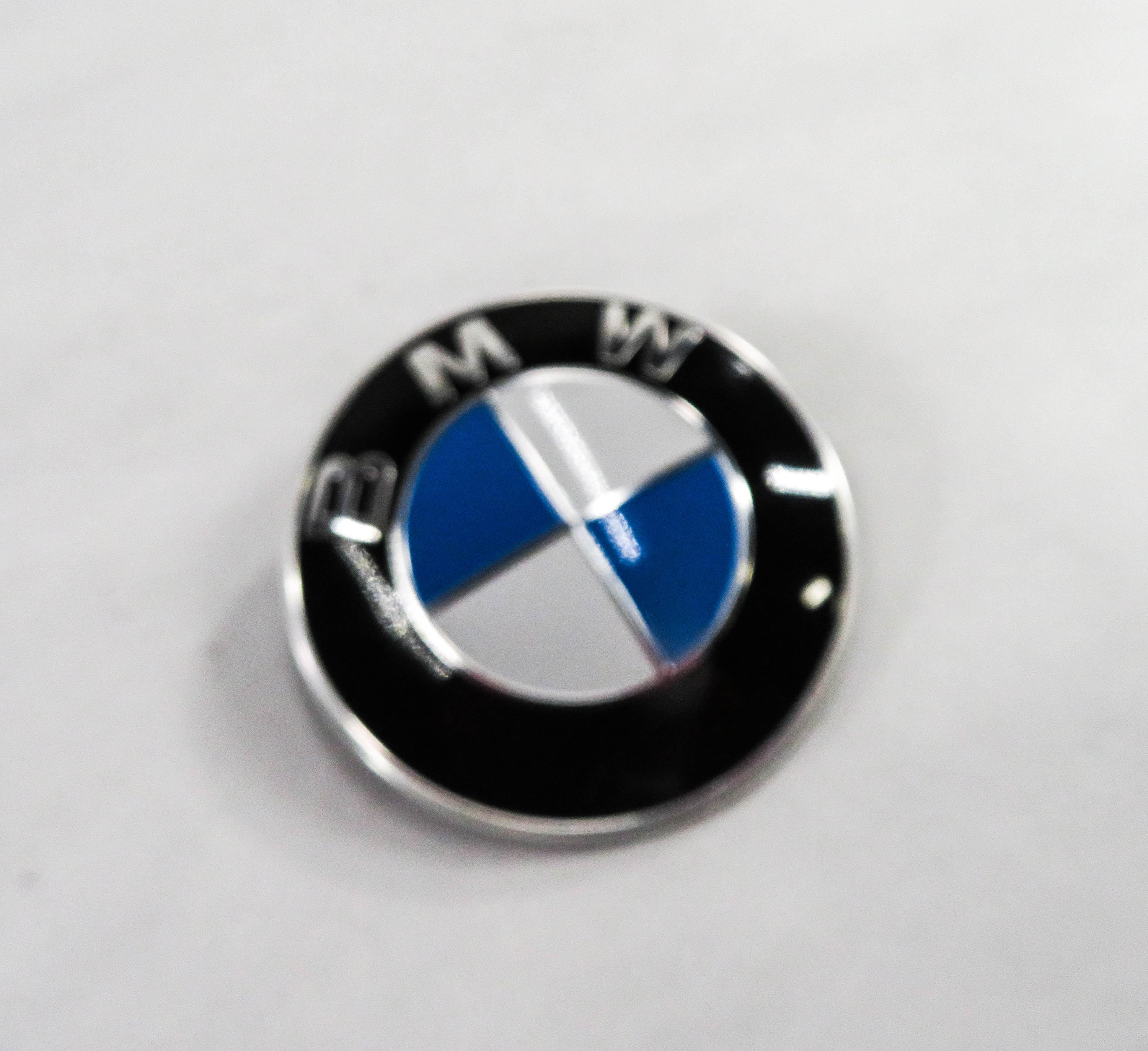 2011 BMW 750i (F01) EMBLEM LOGO BADGE NAME PLATE SYMBOL — exact item pictured