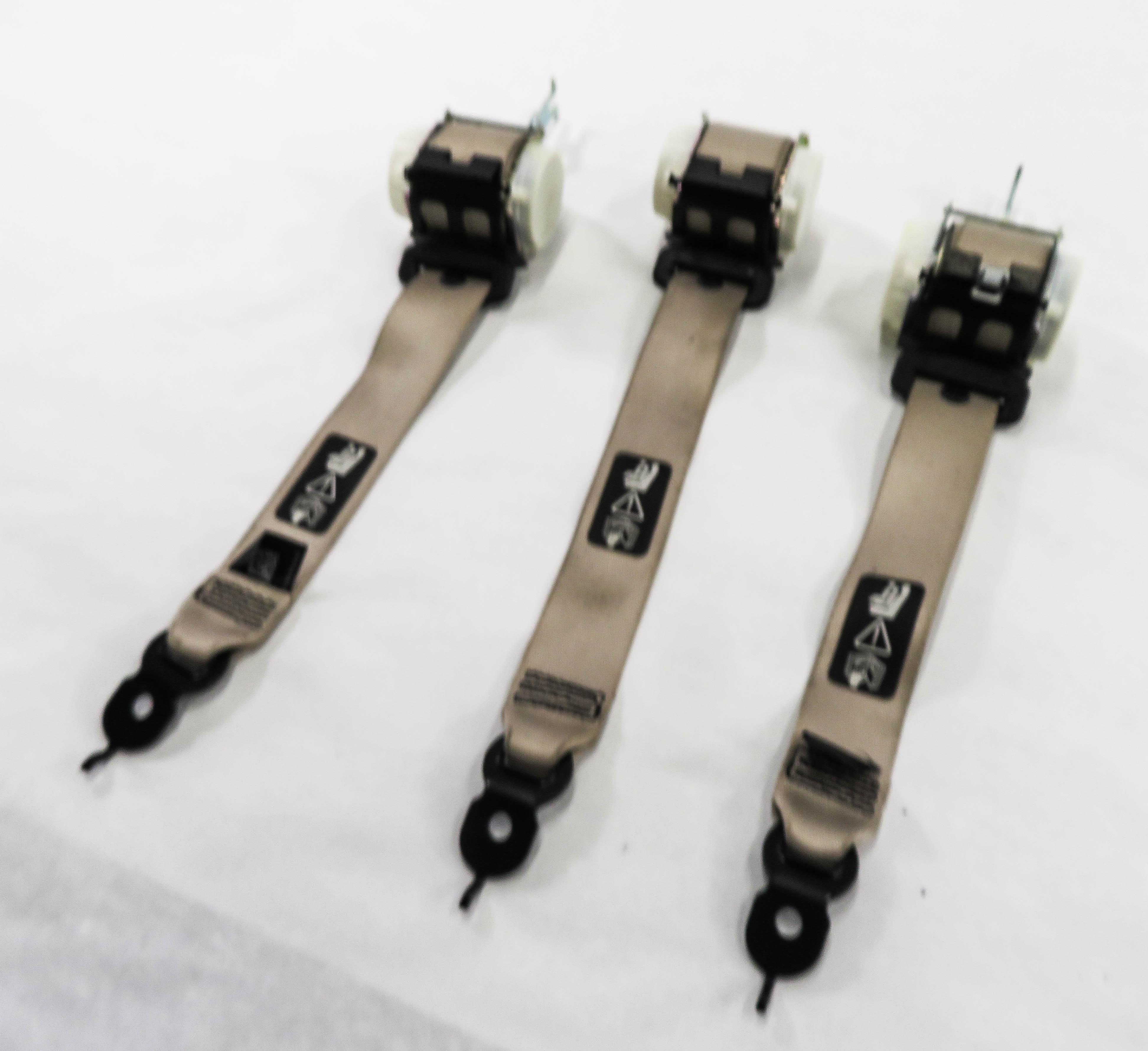 2011 BMW 750i (F01) REAR SEAT SEATBELT RETRACTOR SET-3 (OYSTER) — exact item pictured