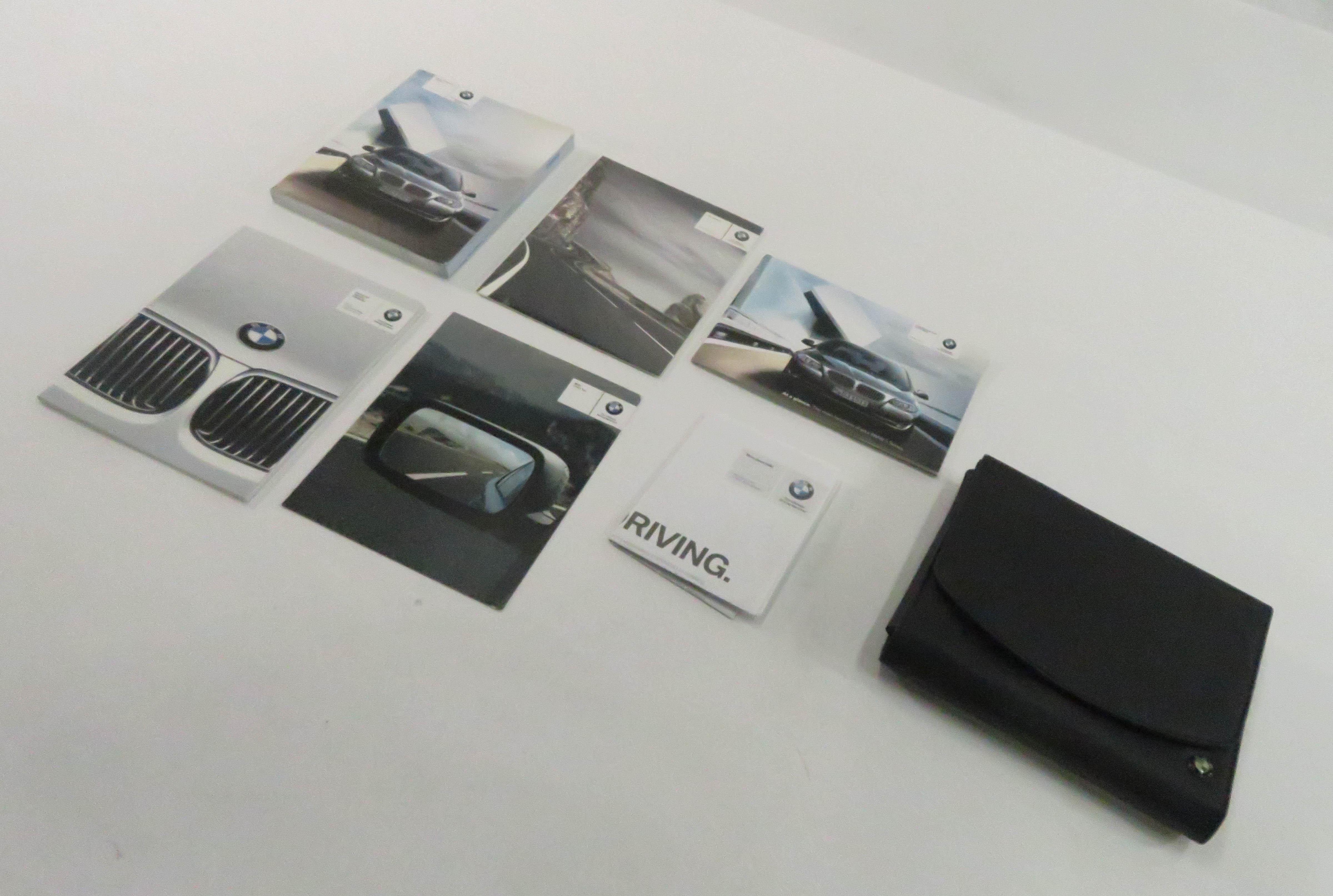 2011 BMW 550i (F10) OWNERS MANUAL BOOK GUIDE SET w/ CASE — exact item pictured