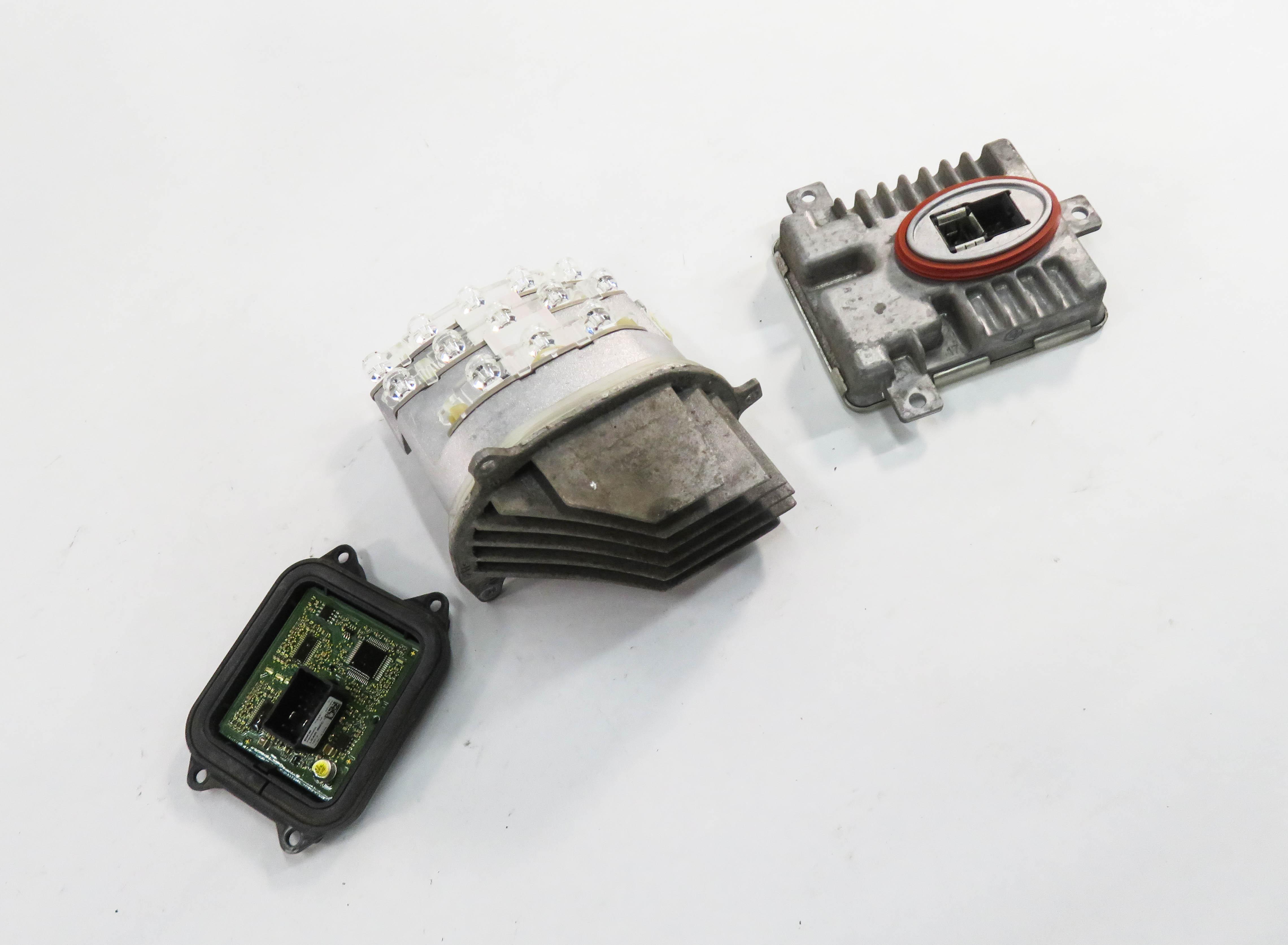 2011 BMW 335i (E90) LEFT XENON HID ADAPTIVE SMC BALLAST CONTROL MODULE SET — exact item pictured