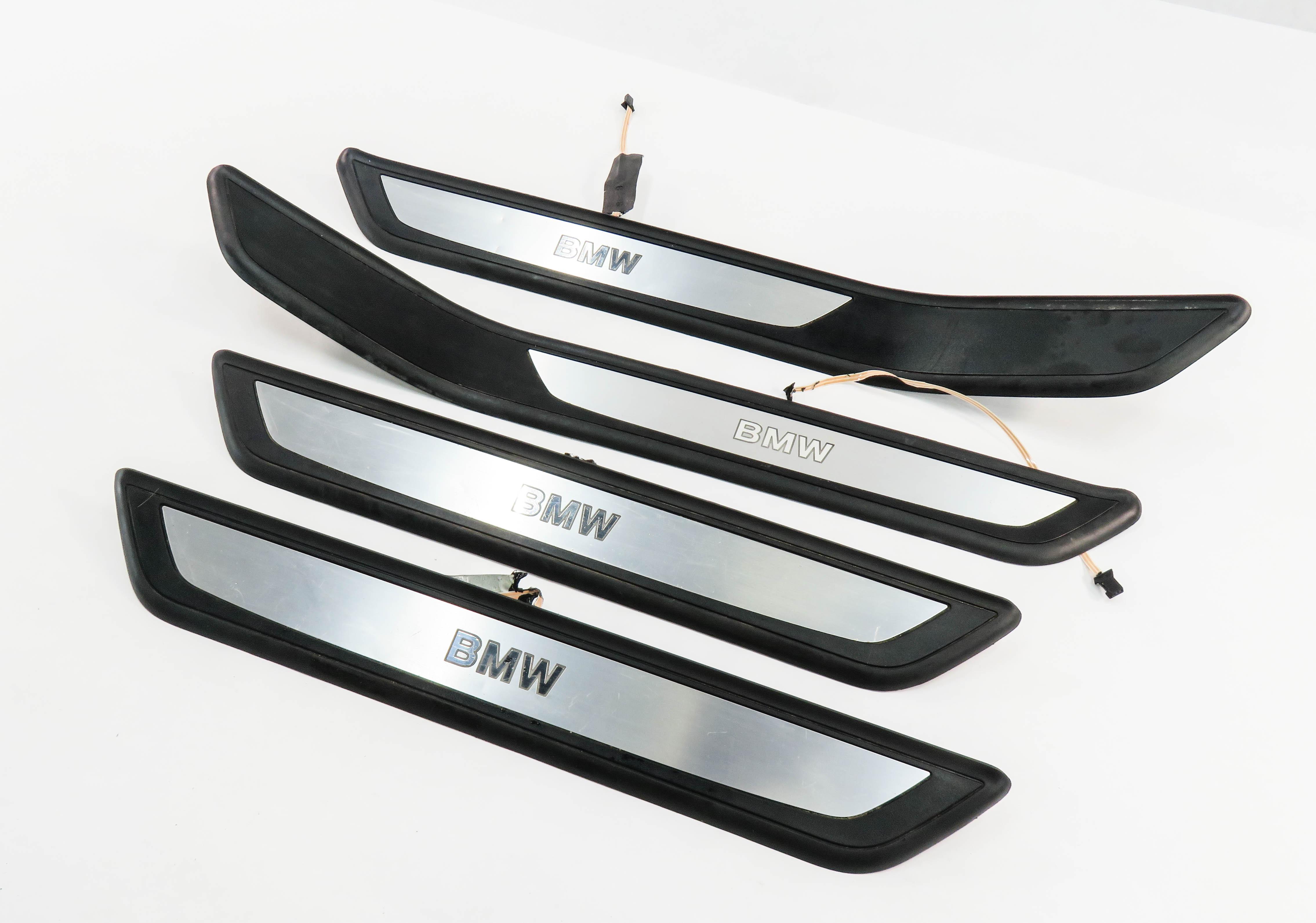 2011 BMW 750i (F01) FRONT & REAR LIGHTED DOOR SILL TRIM SET-4 — exact item pictured