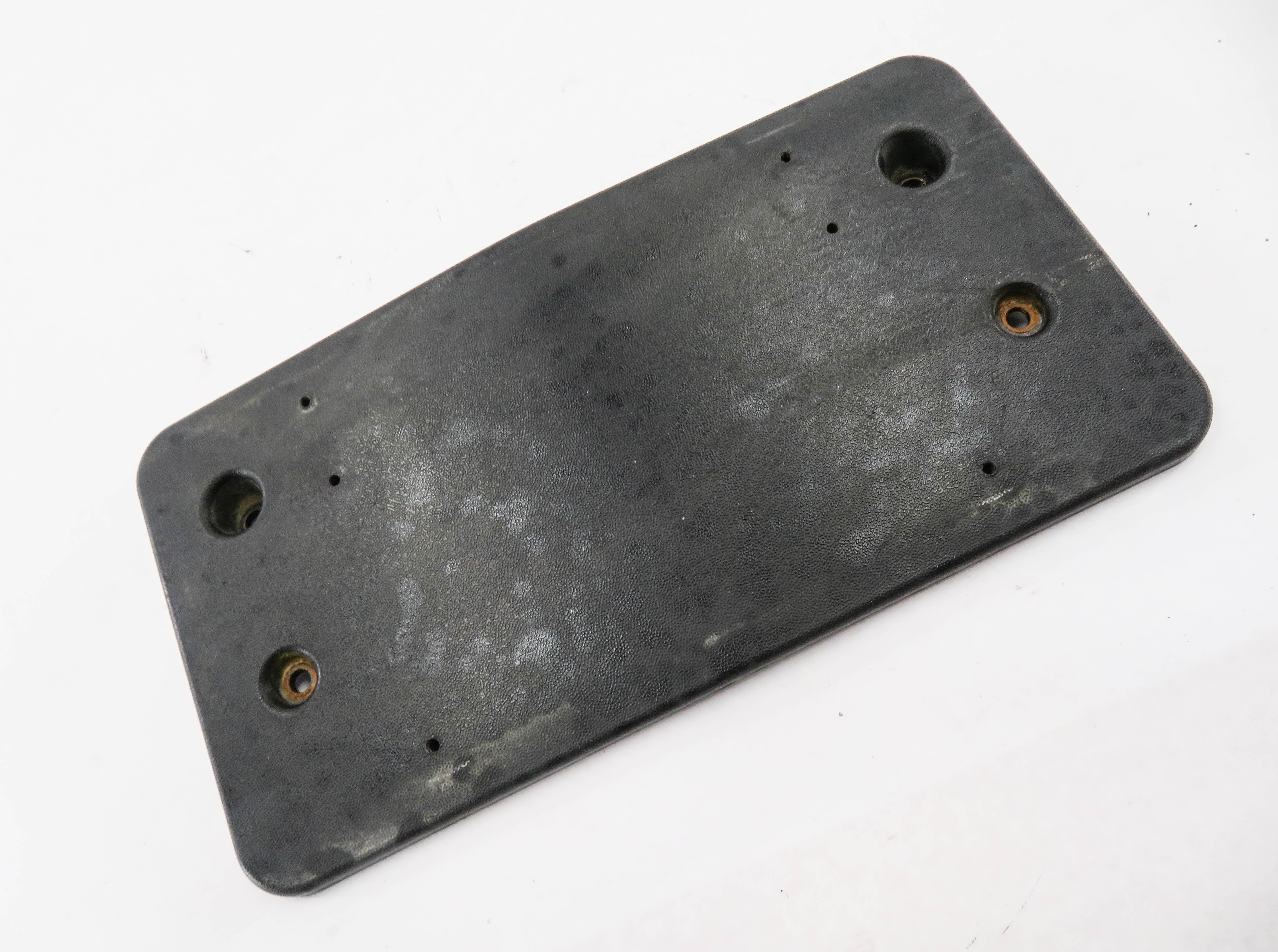 2009 MERCEDES GL320 (X164) FRONT LICENSE PLATE BASE MOUNT BRACKET — exact item pictured