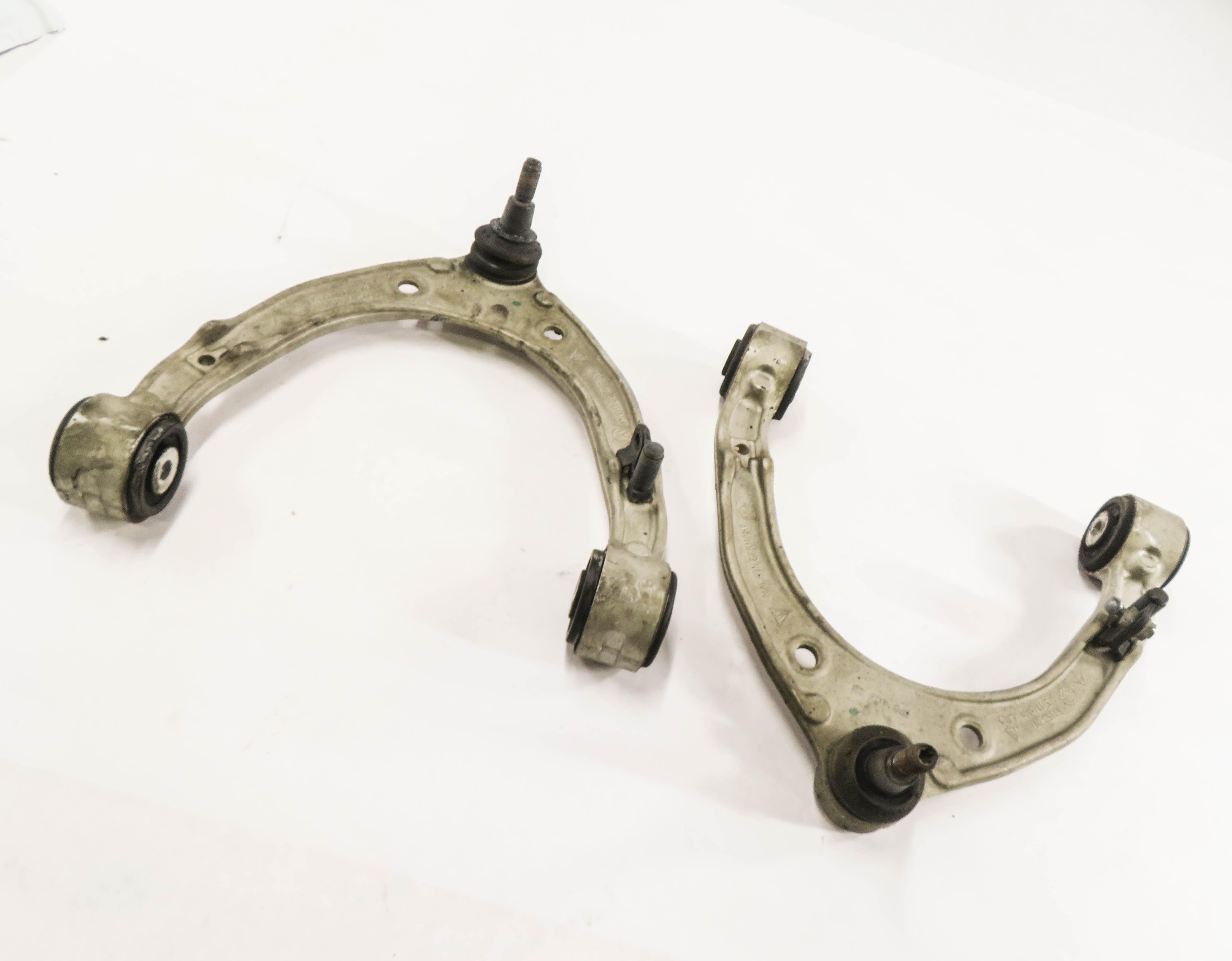 2011-2018 PORSCHE CAYENNE (958) FRONT LEFT & RIGHT UPPER CONTROL ARM SET — exact item pictured