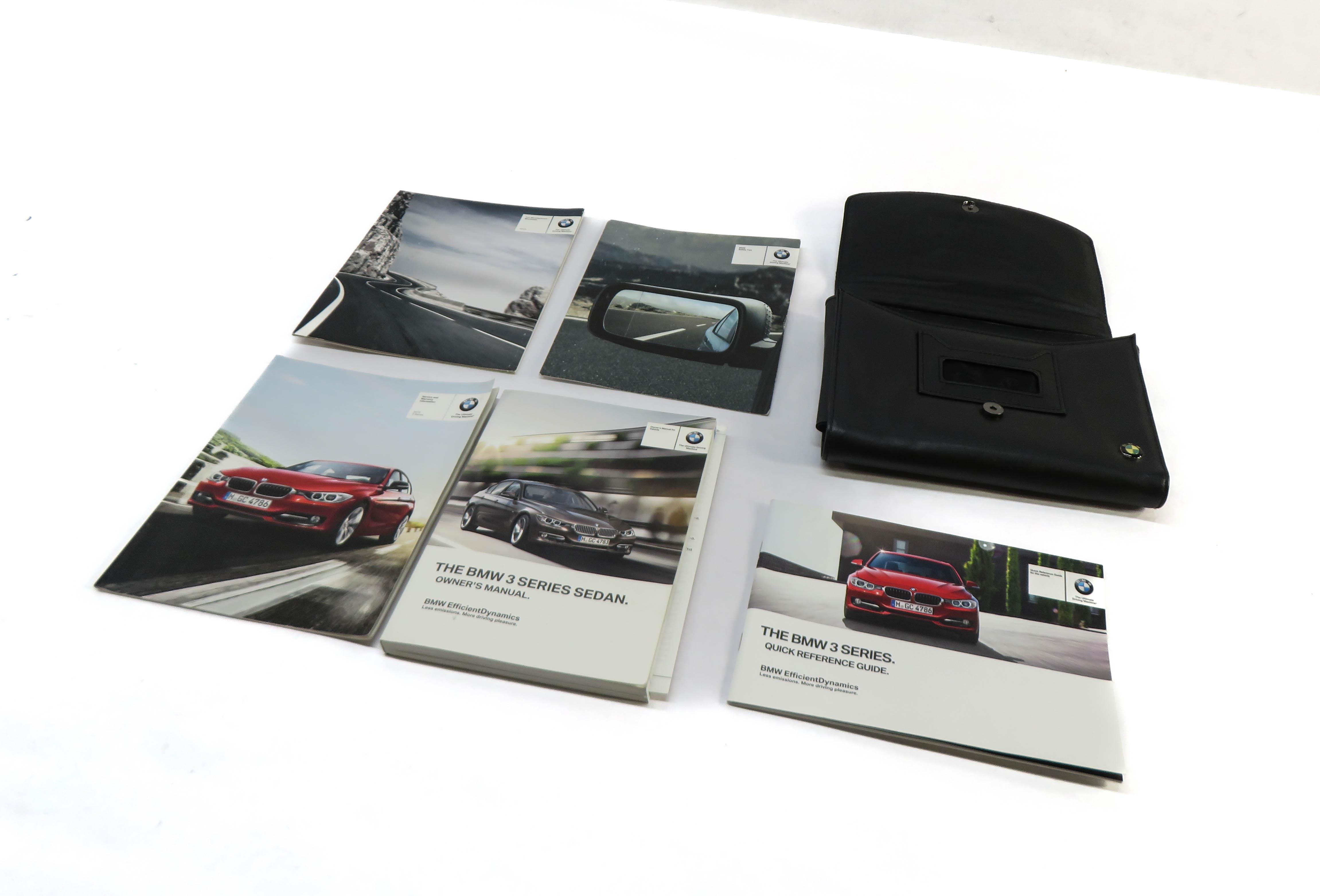 2012 BMW 335i (F30) SEDAN OWNERS MANUAL BOOKLET SET OF 5 w/ BLACK CARRYING CASE — exact item pictured