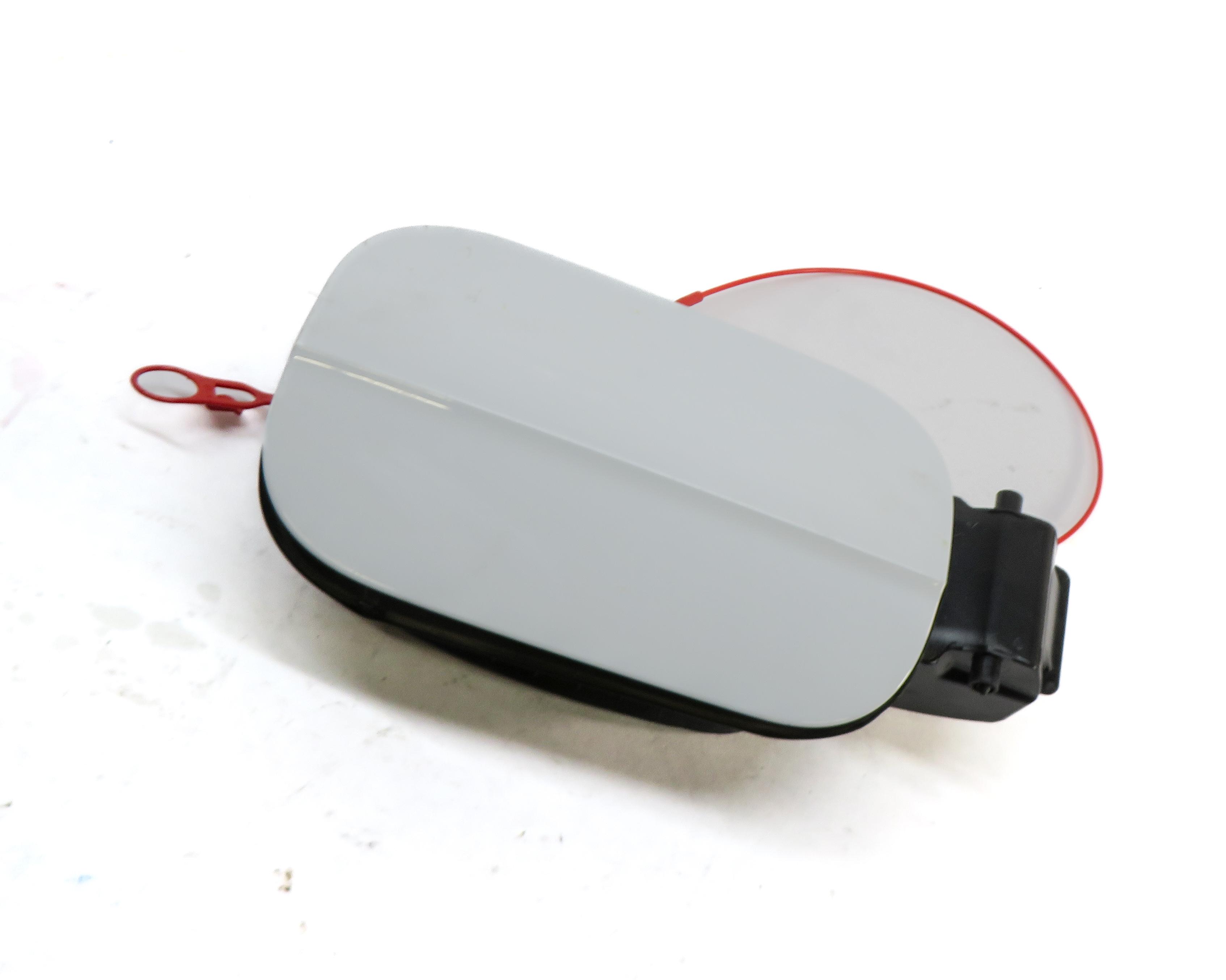 2017-2022 AUDI Q7 (4M) FUEL TANK DOOR TRIM w/ HOUSING (GLACIER WHITE METALLIC) — exact item pictured