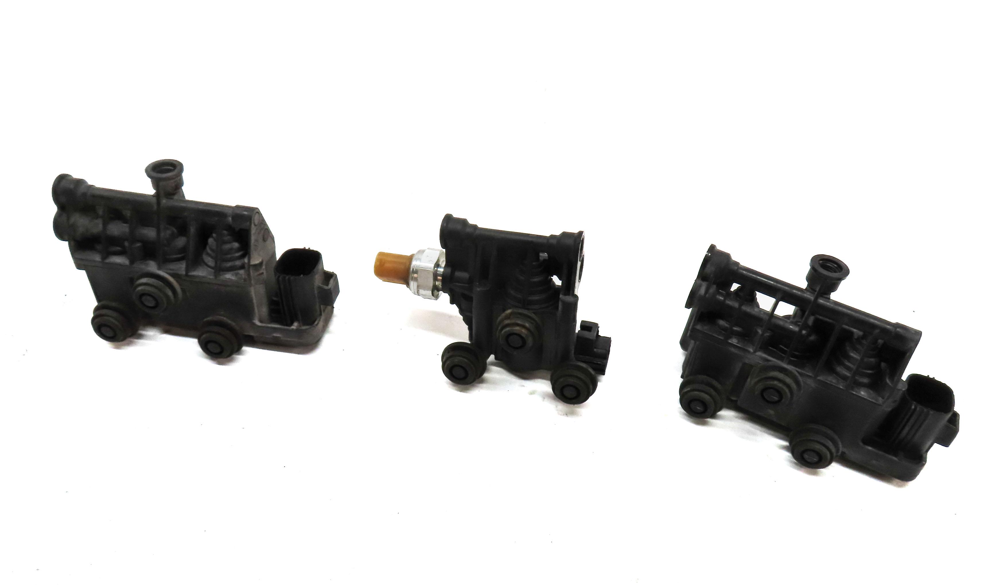 2014 LAND ROVER LR4 AIR SUSPENSION TRANSFER RELIEF VALVE BLOCK SET 3 — exact item pictured