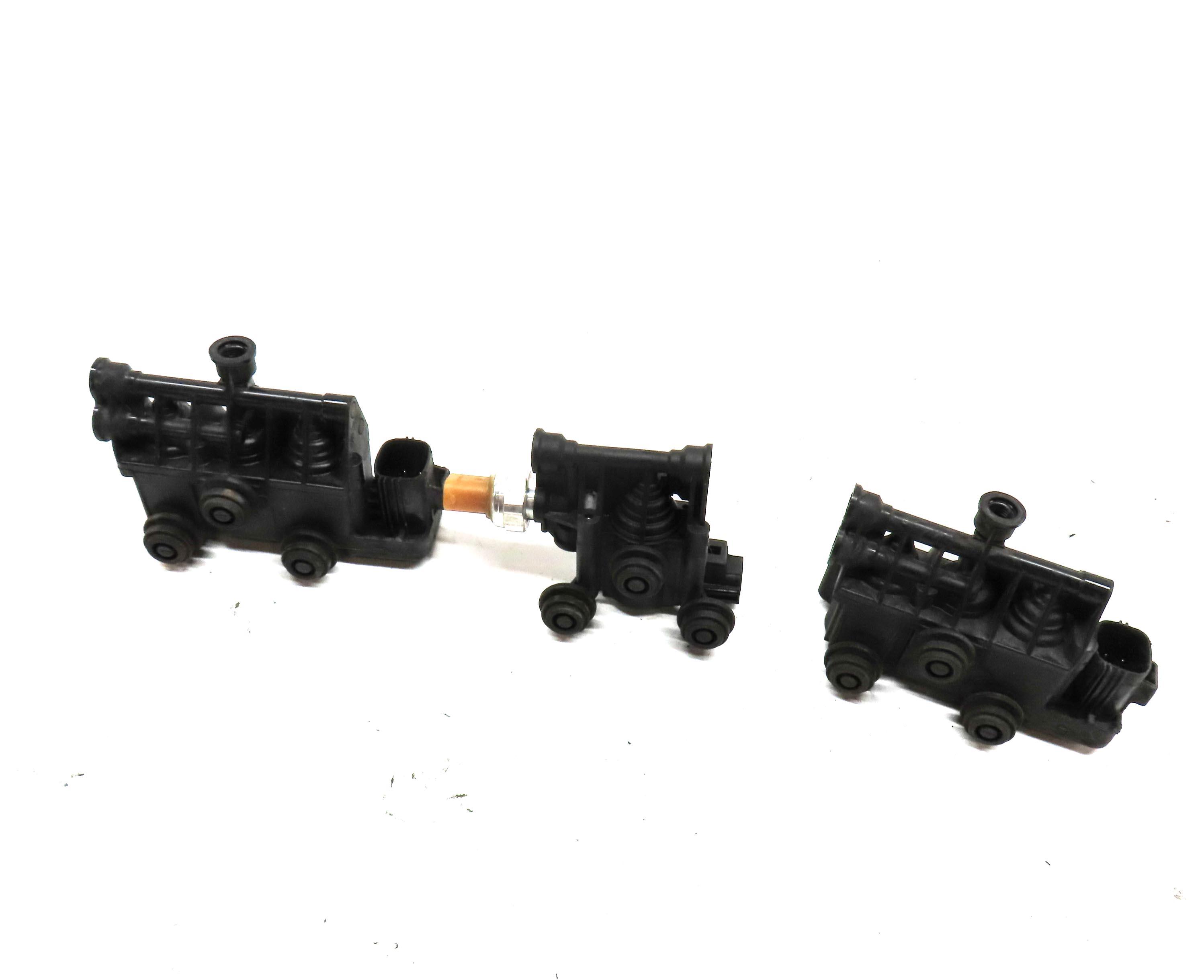 2010 RANGE ROVER SPORT (L320) AIR SUSPENSION TRANSFER RELIEF VALVE BLOCK SET-3 — exact item pictured
