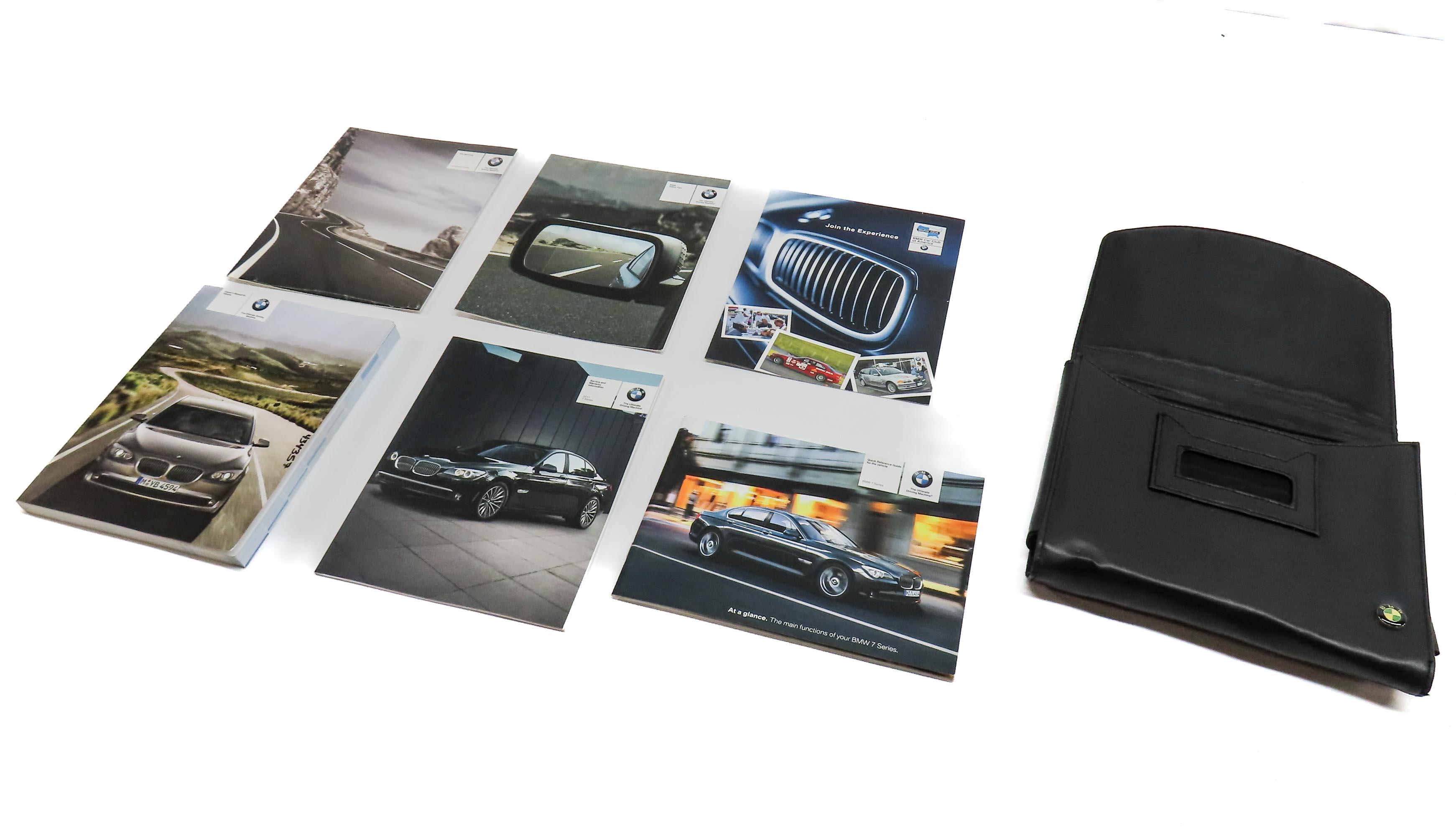 2011 BMW 750i (F01) OWNERS MANUAL BOOKLET SET 6 w/ CARRYING CASE (BLACK) — exact item pictured