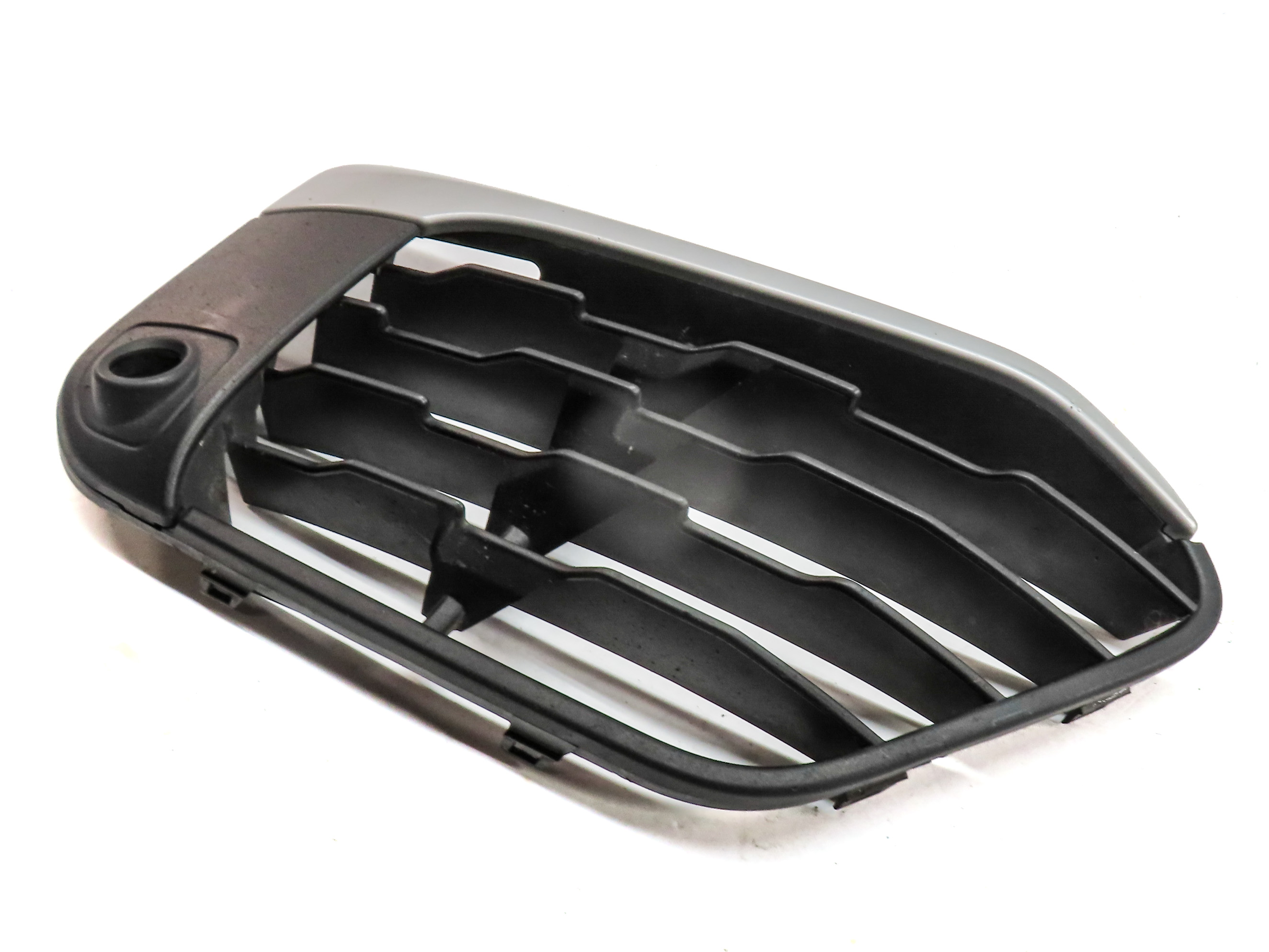 2016-2019 BMW X1 (F48) FRONT RIGHT PASSENGER LOWER BUMPER VENT GRILLE TRIM END — exact item pictured