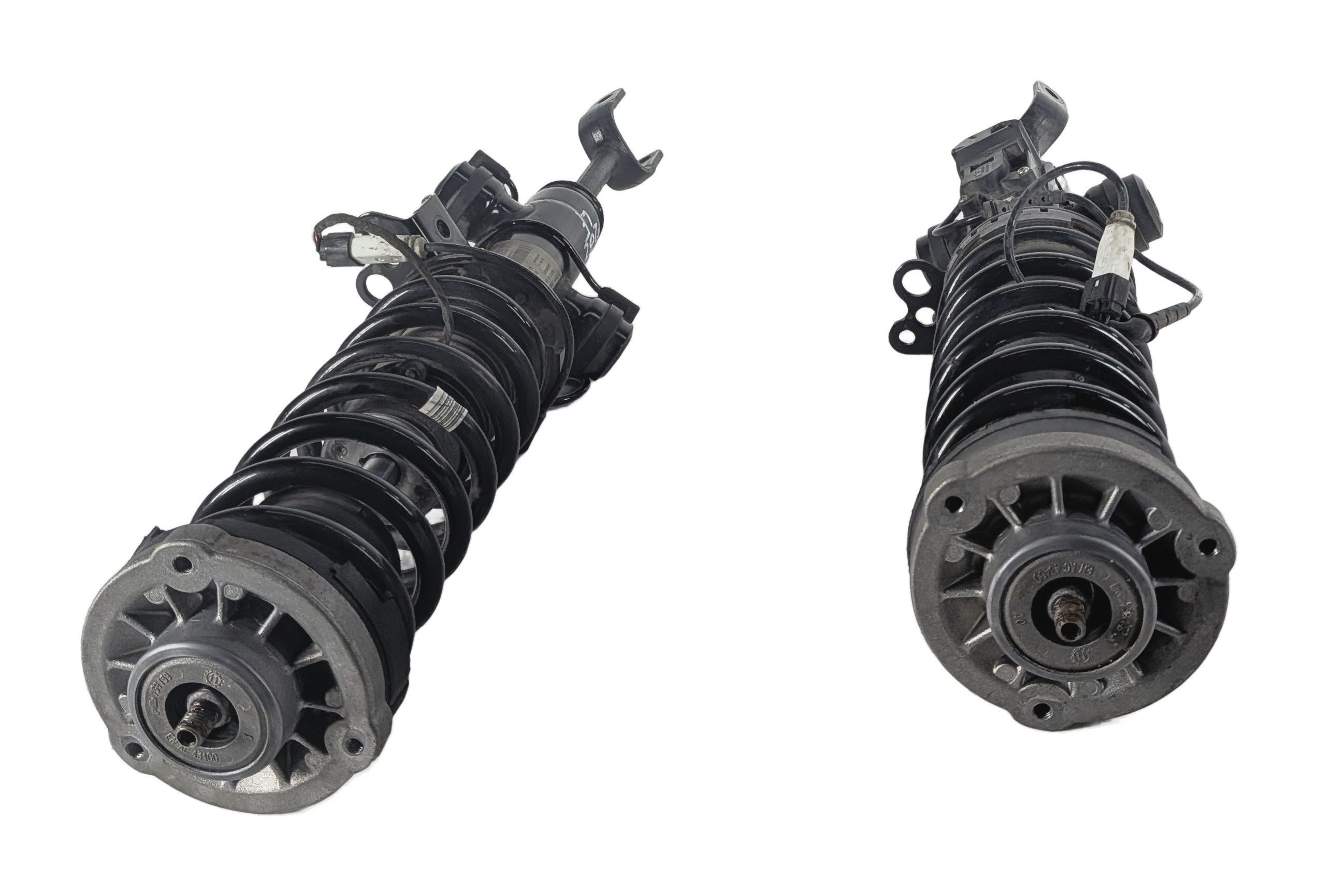 2009-2012 BMW 550iGT 740i 750i B7 (F10 F01) RWD FRONT EDC SHOCK STRUT SET/2 — exact item pictured