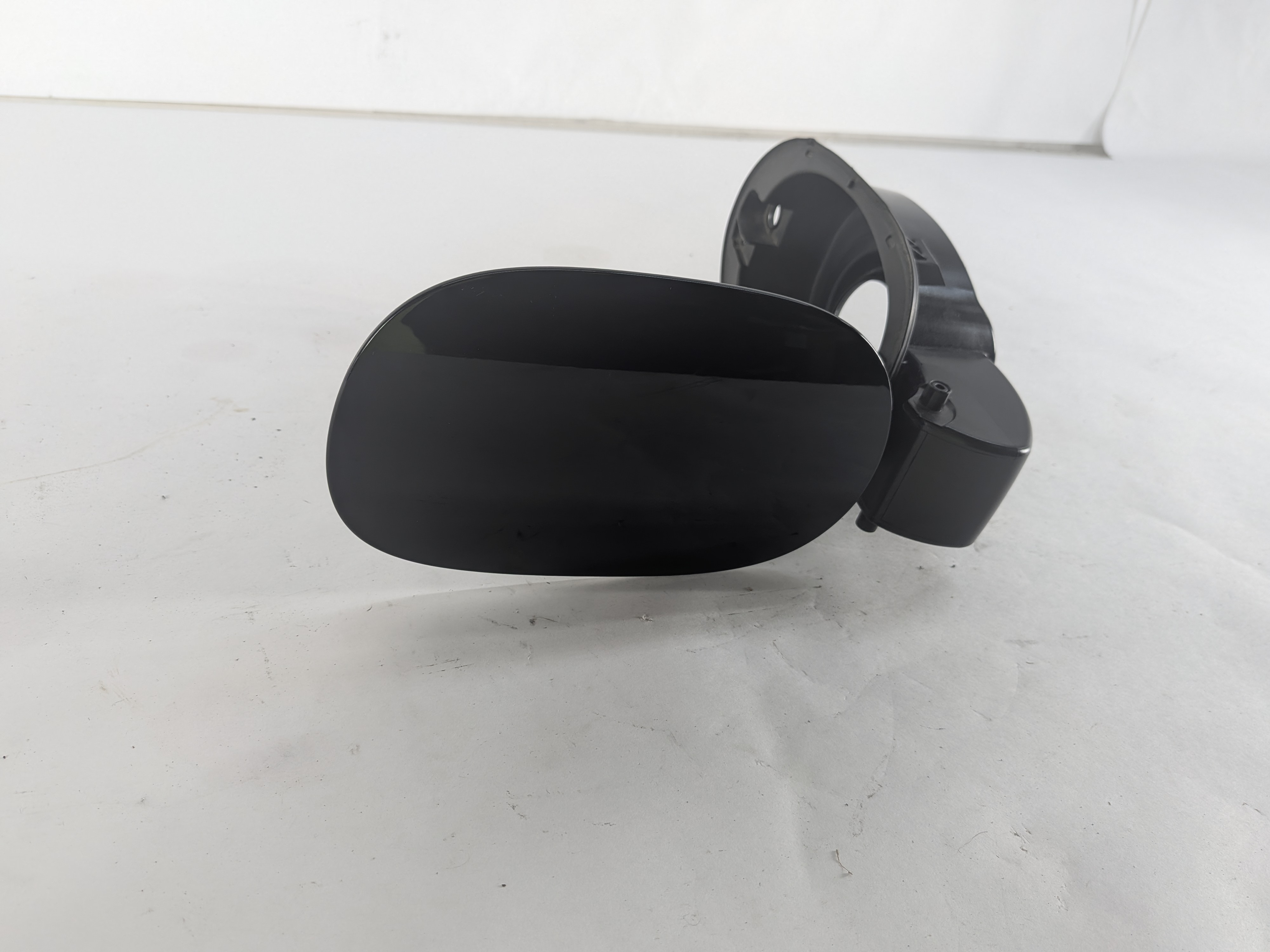 2011-2018 PORSCHE CAYENNE (958) FUEL TANK DOOR w/ HOUSING (Black) — exact item pictured