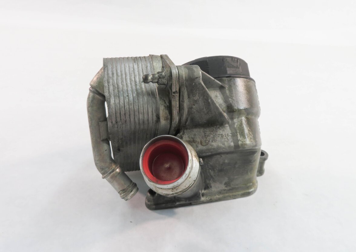 Thumbnail 1: 2008 BMW X5 (E70) 3.0L N52 ENGINE - OIL FILTER ADAPTER w/ COOLER