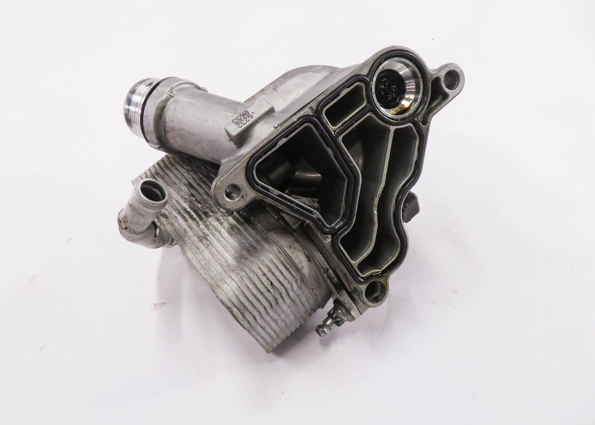 2006 BMW 550i (E60) 3.0L N52 ENGINE- OIL FILTER HOUSING COOLER w/ CAP