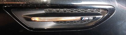 Thumbnail 2: 2013 BMW M5 (F10) FRONT RIGHT PASSENGER FENDER MARKER LIGHT & VENT TRIM (BLACK)