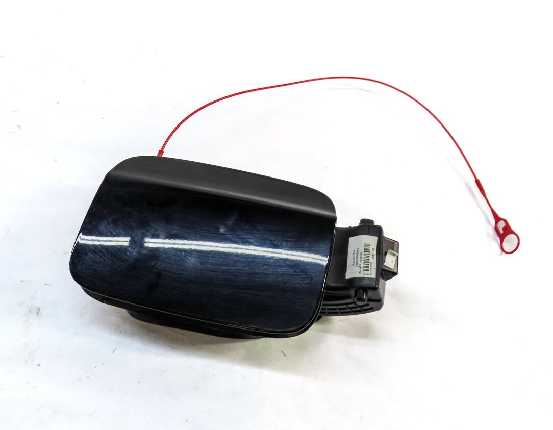 Thumbnail 1: 2015-2018 AUDI Q3 (8U) FUEL TANK DOOR COVER TRIM w/ HOUSING (BRILLIANT BLACK A2)