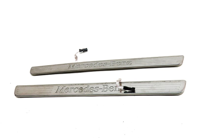 Thumbnail 2: 18 MERCEDES GLS450 (X166) FRONT LEFT & RIGHT LIGHTED DOOR SILL SCUFF TRIM SET/2